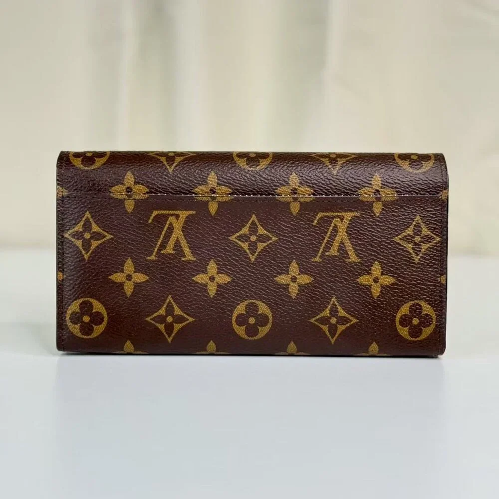 Louis Vuitton Monogram Canvas Wallet with Classic LV Logo Design